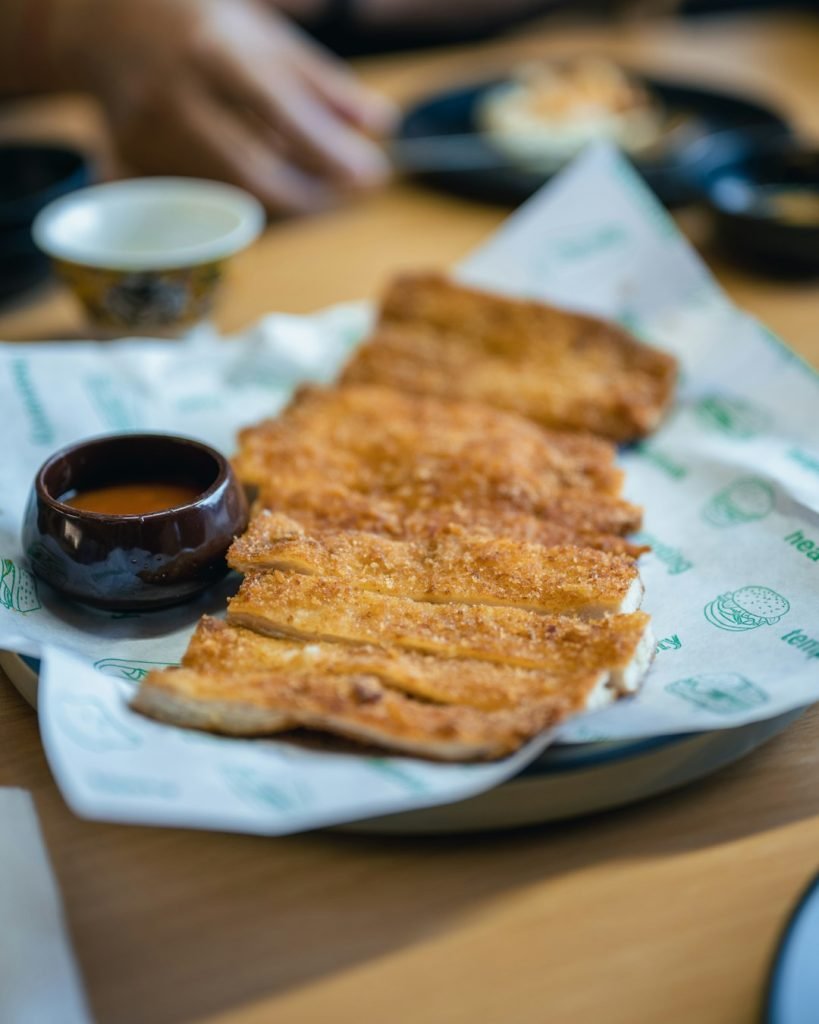 a-close-up-of-a-plate-of-food-on-a-table-9mndzyihdxi