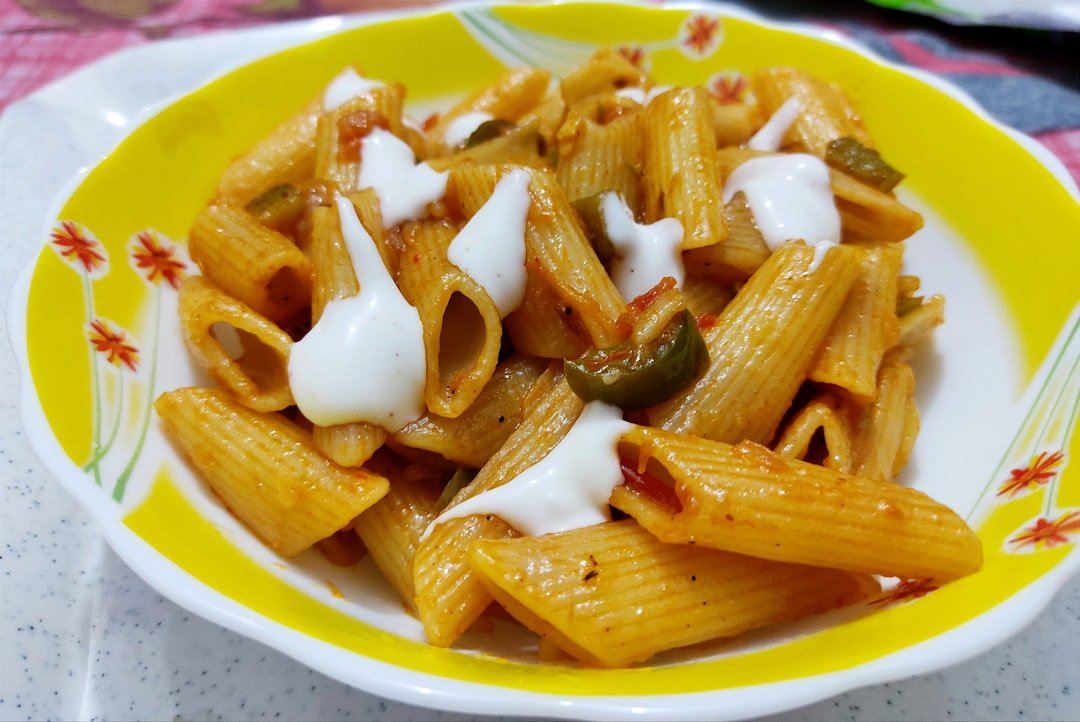 A Bowl filled with Chinese pasta with mayyonaise